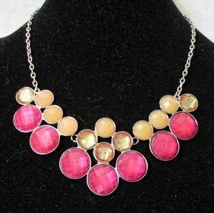 NY silver necklace with pink and yellow rhinestone